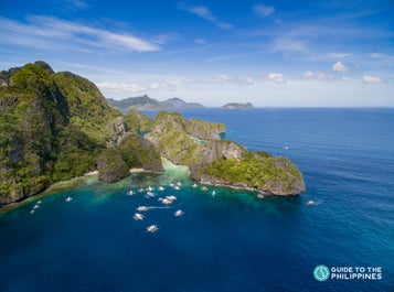 Rock formations and deep blue waters at El Nido Palawan