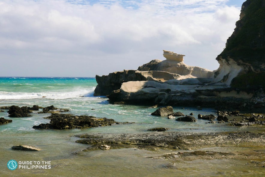 The anvil-shaped rock at the Kapurpurawan Rock Formations The anvil-shaped rock at the Kapurpurawan Rock Formations