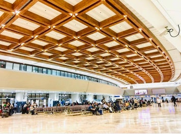 Rows of chairs at a waiting area in NAIA