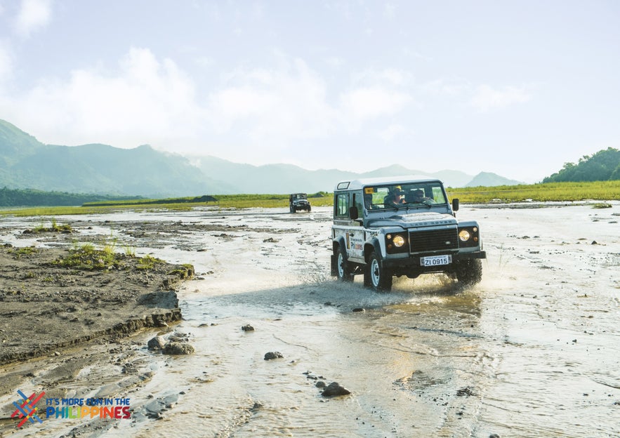 Hikers ride 4x4 cars across Mt. Pinatubo's fields Hikers ride 4x4 cars across Mt. Pinatubo's fields