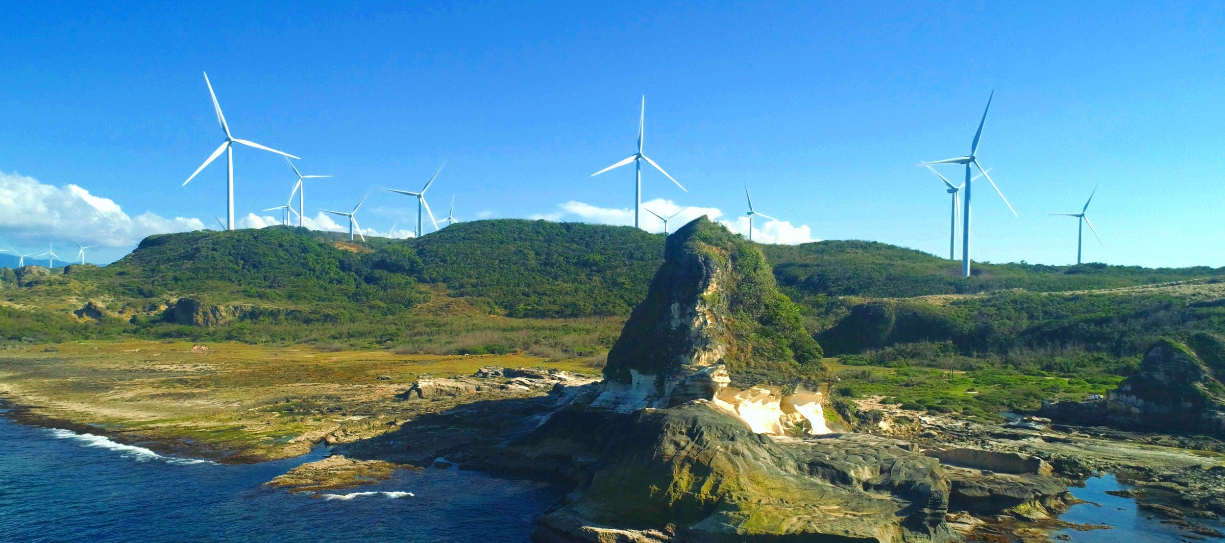 View of the windmills at the Kapurpurawan Rock Formations - Copy.jpg