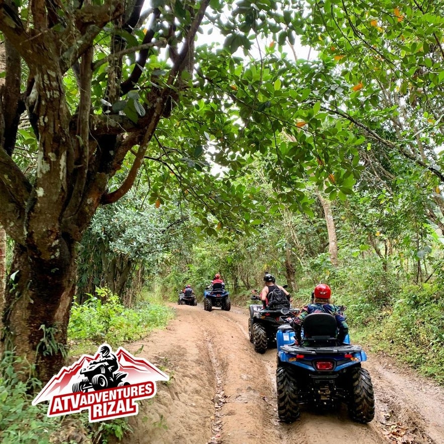 People follow a guide in ATV Adventures Rizal People follow a guide in ATV Adventures Rizal