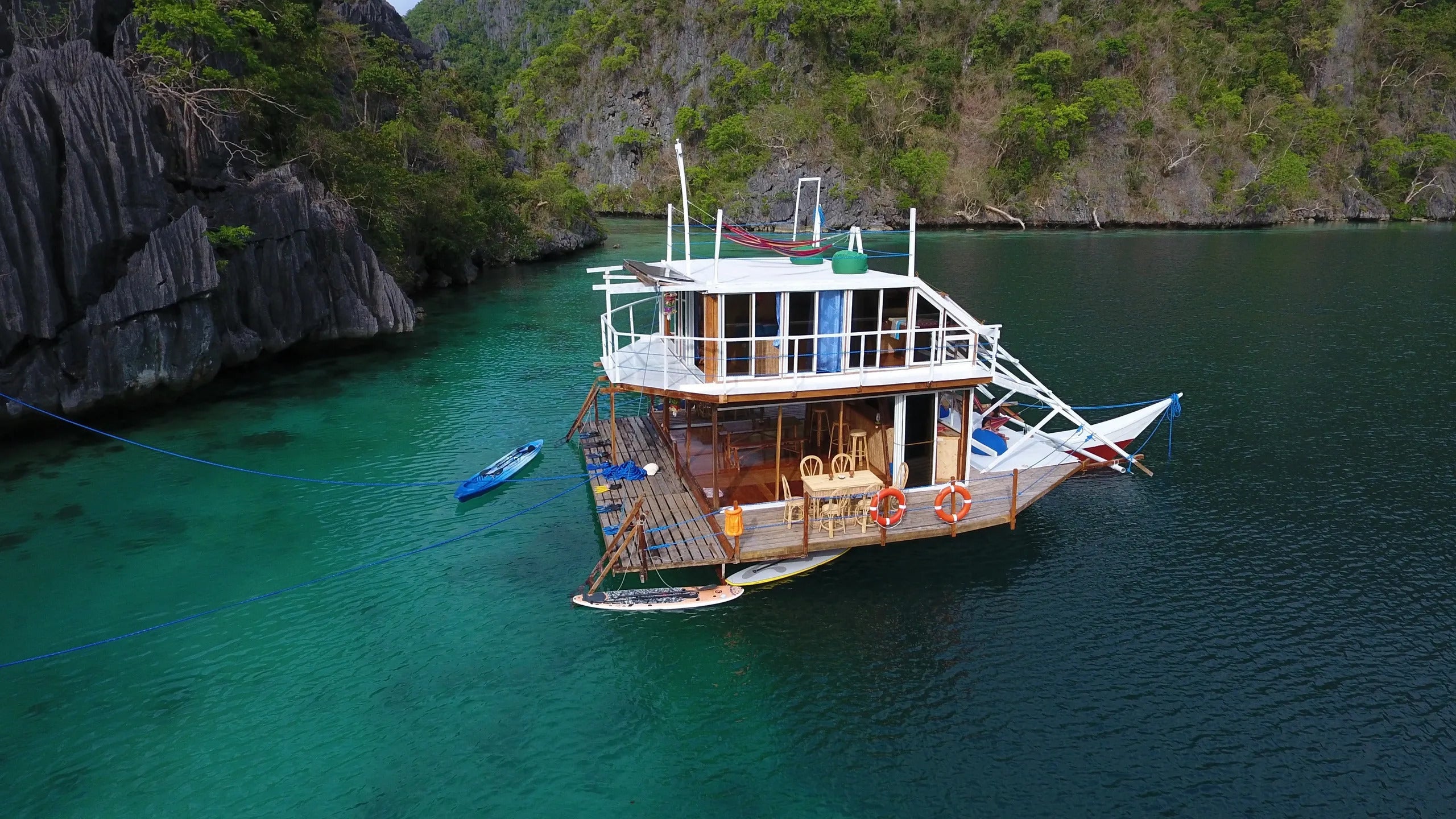 The Paolyn Houseboat in a lagoon in Palawan