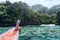 Woman sits on boat in El Nido