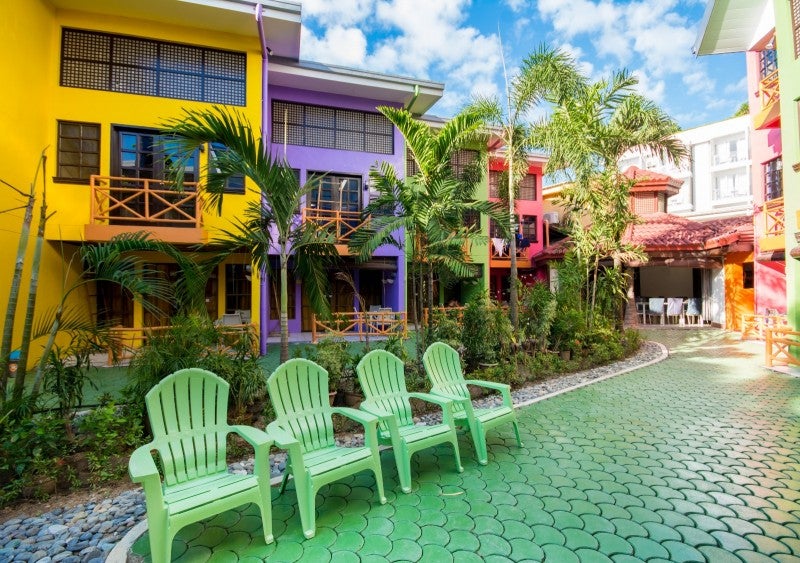 Lounge chairs in The Club Ten Beach Resort Boracay