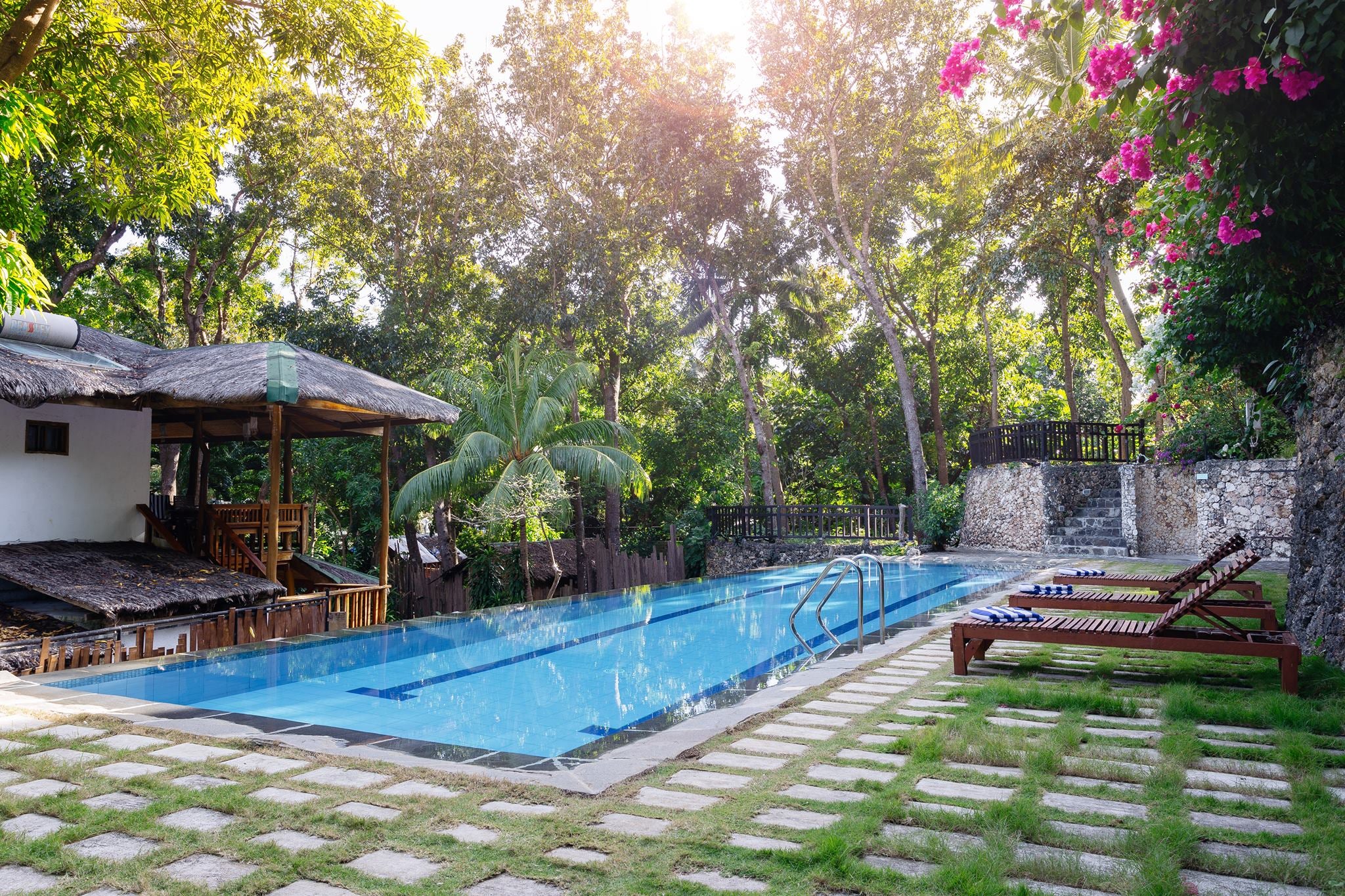 The Strand Boutique Resort's outdoor lap pool