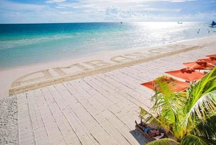 Beach front view of Ambassador in Paradise