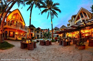This 4-day and 3-night Boracay Island tour package offers a luxurious stay at the beautiful Ambassador in Paradise Resort, where stunning beachfront views await