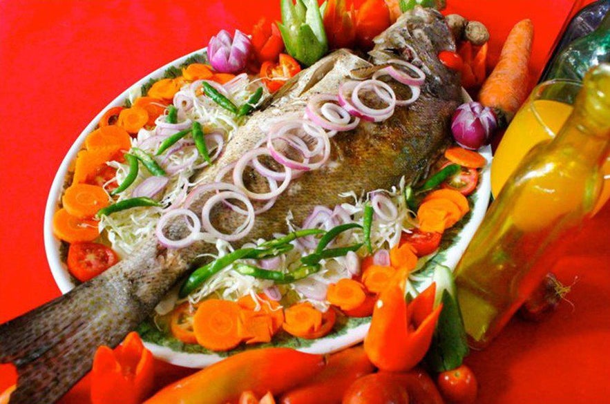 Charcoal grilled fish by Loboc Riverwatch Floating Restaurant Charcoal grilled fish by Loboc Riverwatch Floating Restaurant