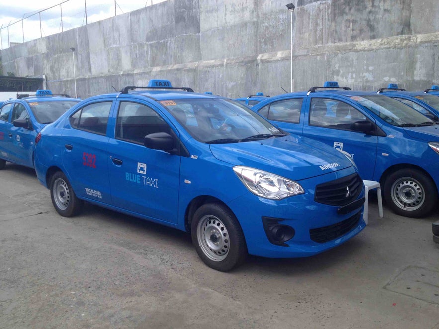A blue taxi in Davao A blue taxi in Davao