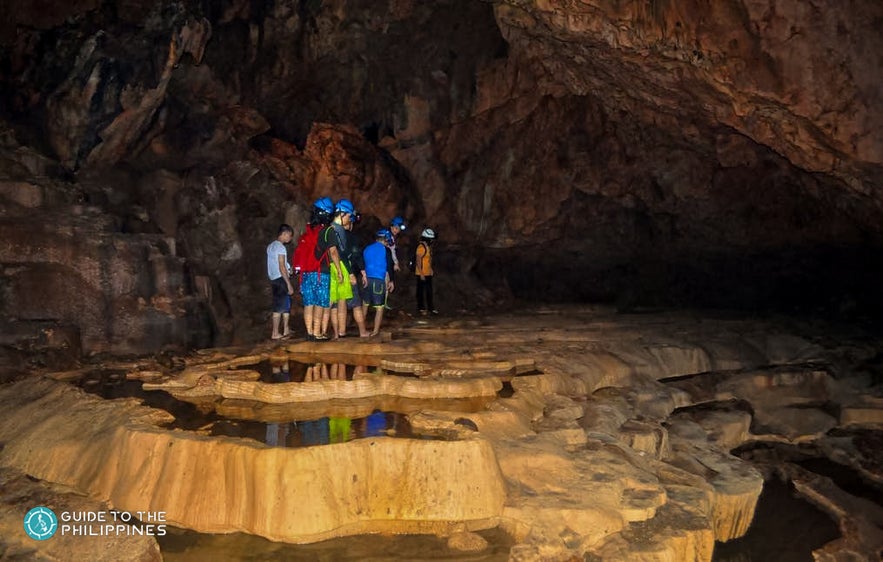 Tourists explore Bagumbungan Cave Tourists explore Bagumbungan Cave