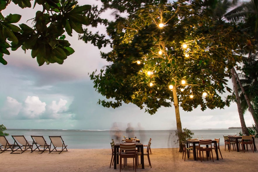Kalinaw Resort Restaurant's beach tables Kalinaw Resort Restaurant's beach tables