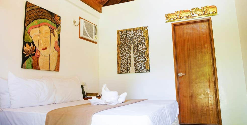 Rest in a well-kept room at G Villas Resort during this 4-day, 3-night tour package in Siargao Island.
