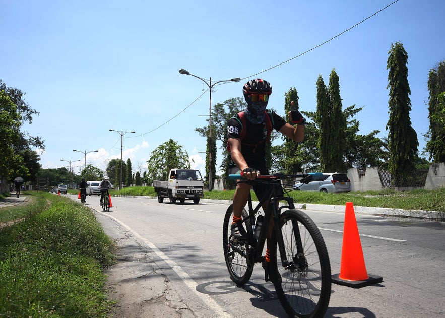 Biker along Taguig's C6 road Biker along Taguig's C6 road