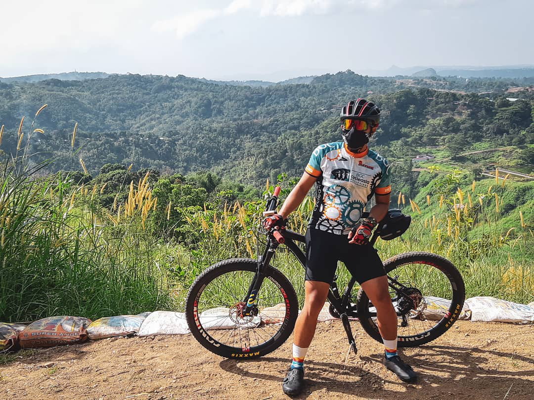 A biker by Camp Sinai's ridge