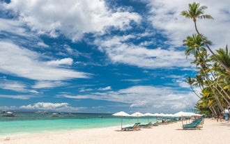 Stroll along Alona Beach’s soft sands during this private Panglao Island tour.