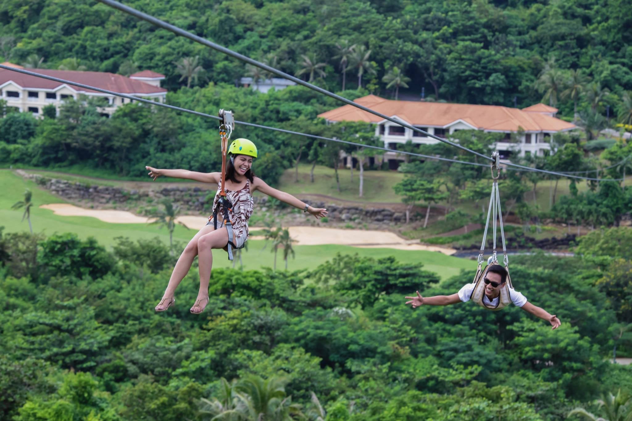 Tourists try the zipline in Fairways and Bluewater Boracay Tourists try the zipline in Fairways and Bluewater Boracay
