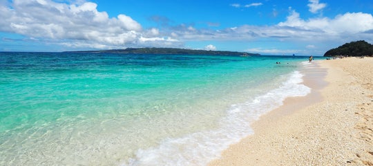 Waves lapping Puka Beach.jpg