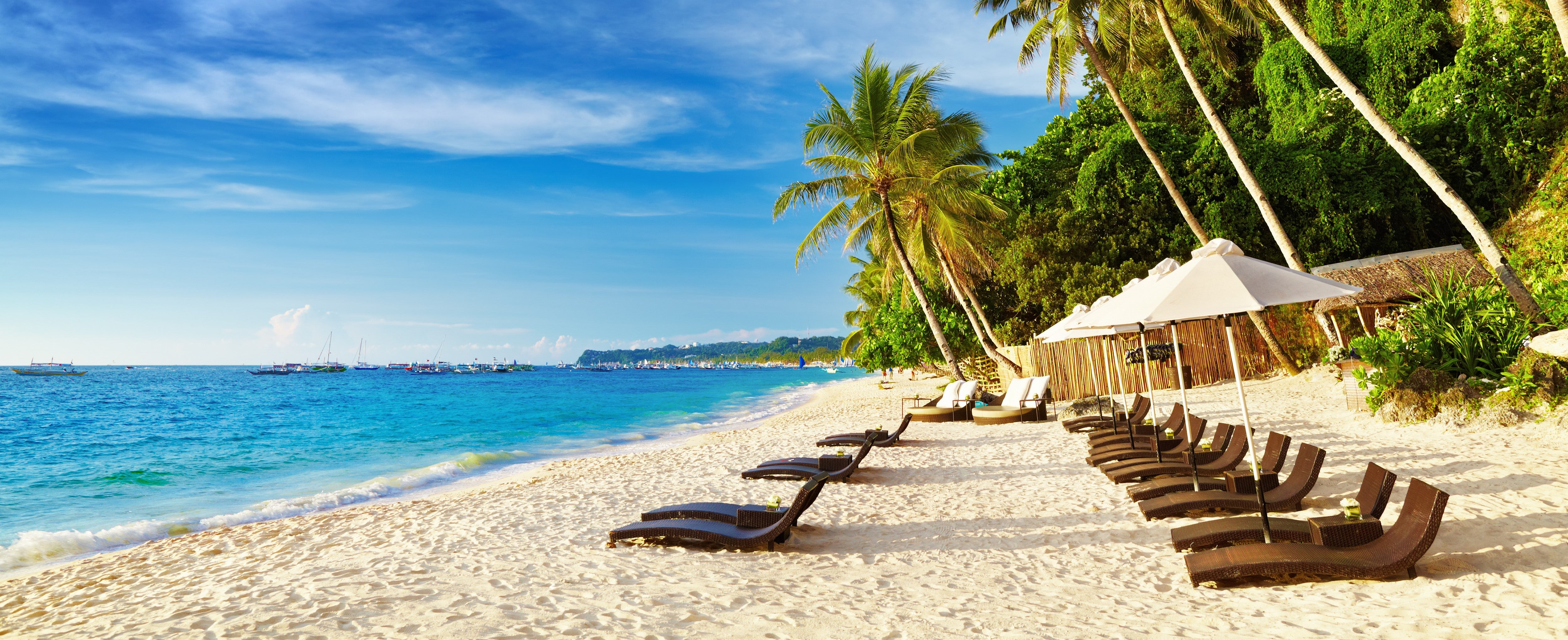 Top banner_Beach chairs on Boracay's White Beach-2.jpg