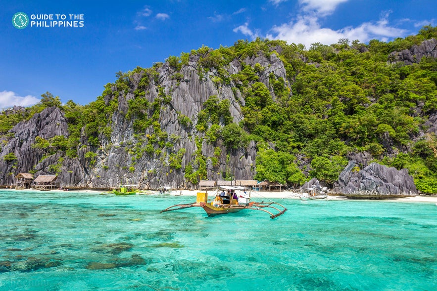 Boat docking on a beach in Coron Boat docking on a beach in Coron