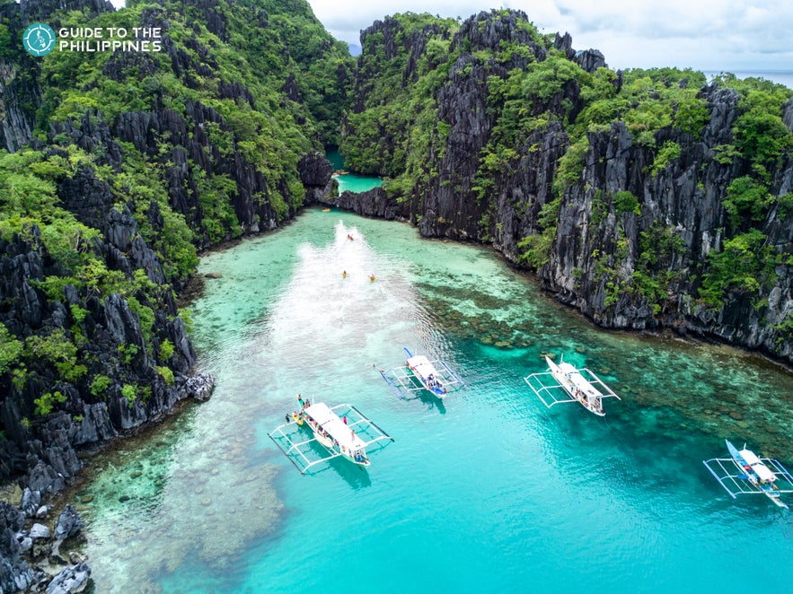 Boats docked at a lagoon in El Nido Boats docked at a lagoon in El Nido