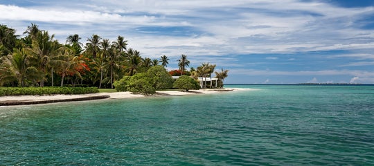 TopBanner_Banwa Private Island Resort's shoreline.jpg