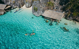 Paddle through the calm waters of Twin Lagoon during this Coron island hopping tour
