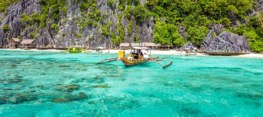Boat sailing from an island in Coron.jpg