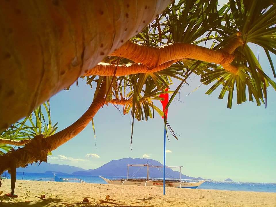 Sun bathing at Bonbon Beach