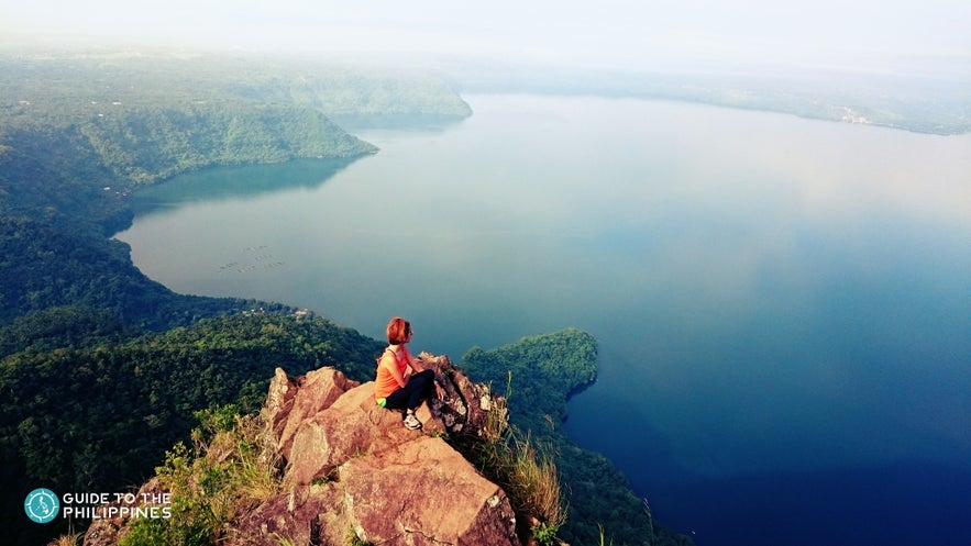 Woman enjoys the view from Mt. Maculot in Batangas Woman enjoys the view from Mt. Maculot in Batangas