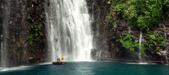 TopBannerPeople floating on raft by the Tinago Falls.jpg