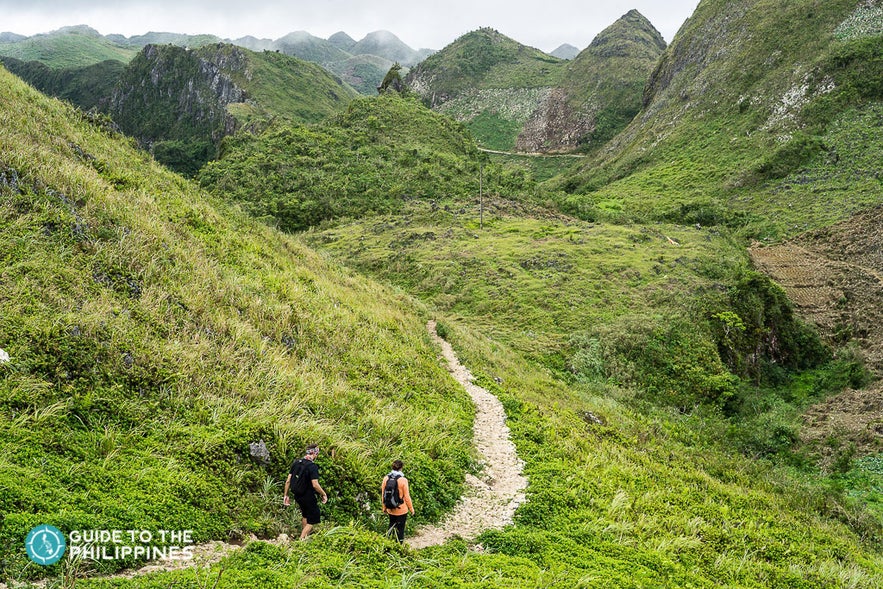 Hikers on a trail in Osmena Peak Hikers on a trail in Osmena Peak
