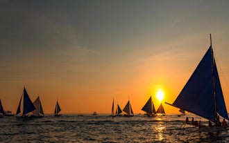 If there's a will, there's a wave and enjoy the sunset paraw sailing at Boracay Islands