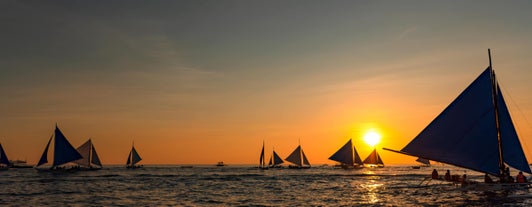 If there's a will, there's a wave and enjoy the sunset paraw sailing at Boracay Islands