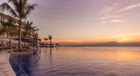 sunset at the pool area of Dusit Thani Mactan