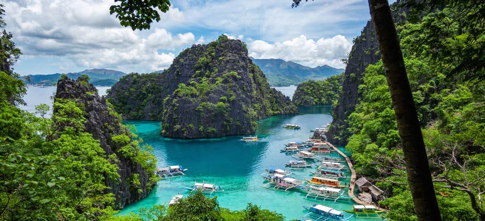 Explore the breathtaking Twin Lagoon in Palawan Island during this tour package to Coron Town, El Nido Town, and Puerto Princesa City.