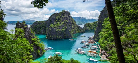 Explore the breathtaking Twin Lagoon in Palawan Island during this tour package to Coron Town, El Nido Town, and Puerto Princesa City.