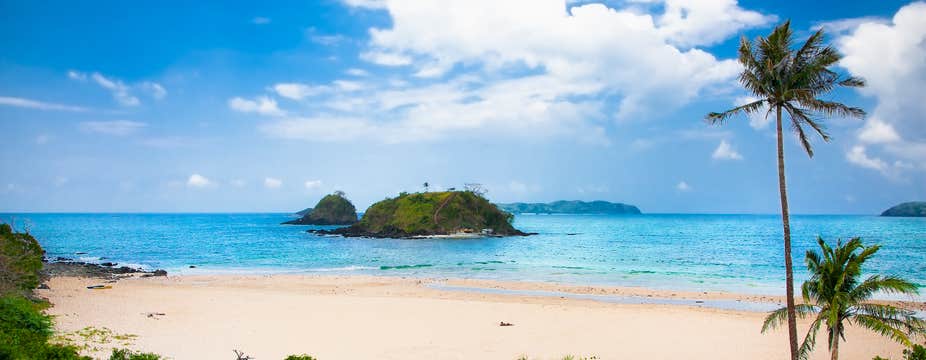 Private El Nido Town Tour to Nacpan Beach and the Shores of Marimegmeg & Lio with Lunch & Transfers