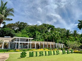 Stroll through lush gardens and white sand shores during this Misibis Bay Resort day tour.