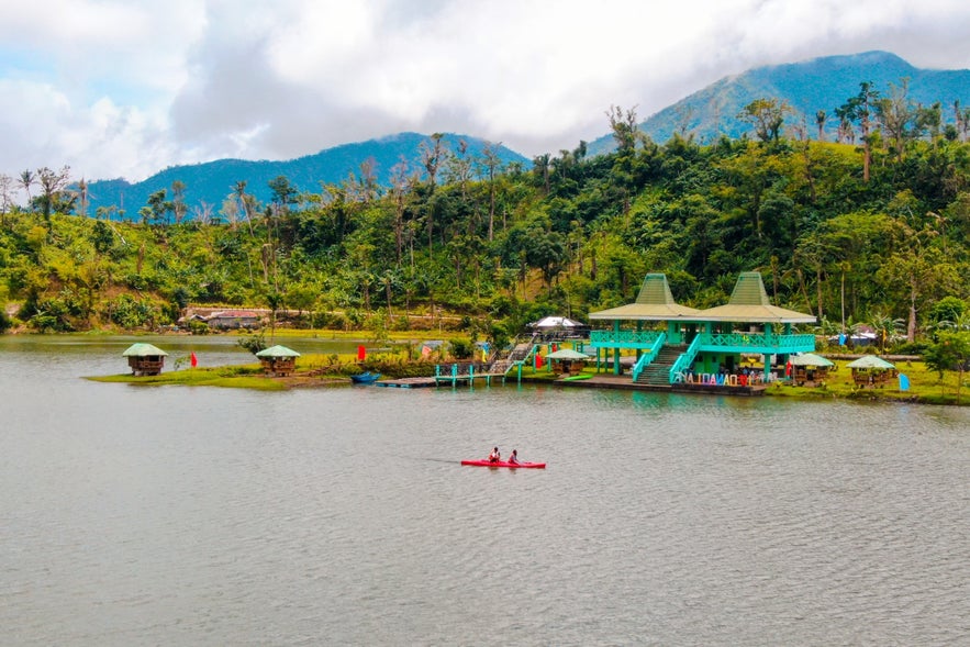 Travelers kayaking on Danao Lake Travelers kayaking on Danao Lake