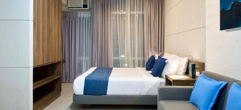 Comfy 2-Day Makati The Sphere Serviced Residences Package with Breakfast & Manila Airport Transfers