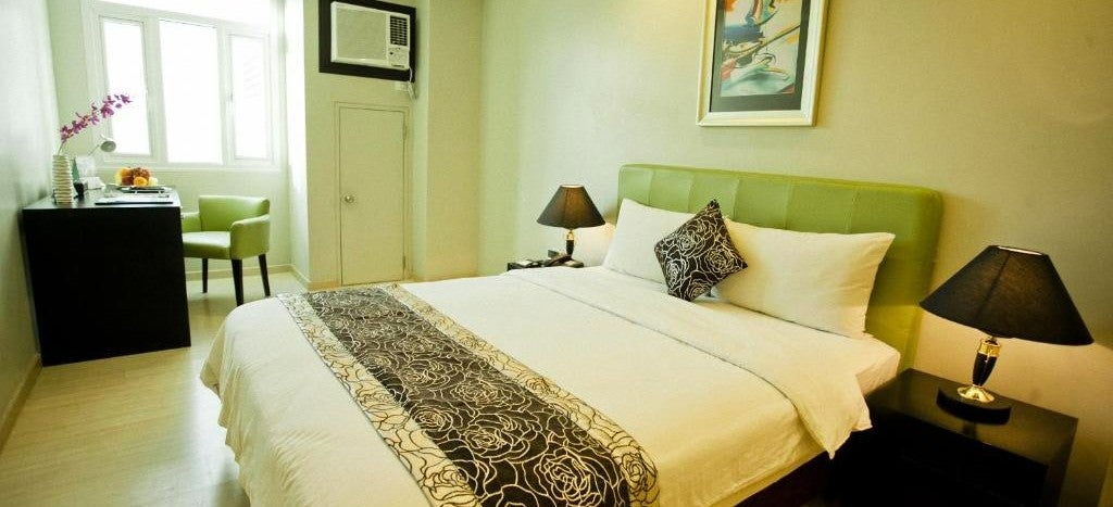 Deluxe Classic Room at The Exchange Regency Residence Hotel Ortigas