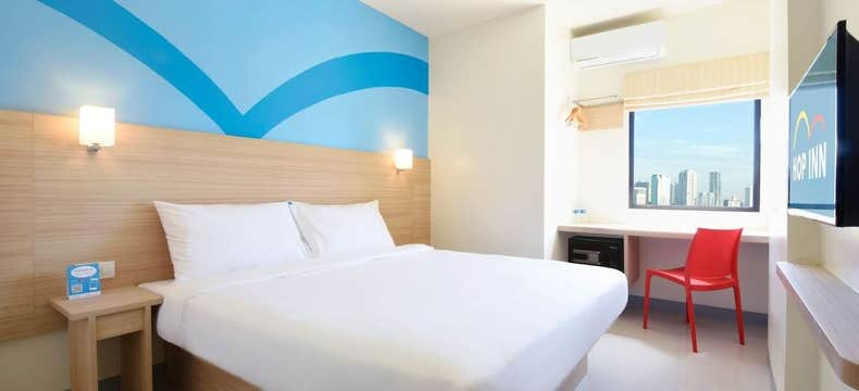 Budget-Friendly 2-Day Hop Inn Ortigas Package with Manila Airport Transfers