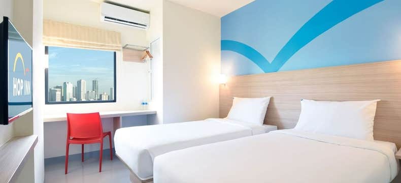 Low-Cost 2-Day Hop Inn Makati Hotel Package with Manila Airport Transfers