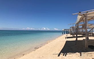Stroll around Carbin Reef's beach