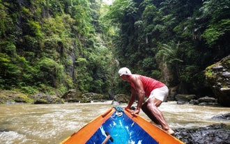 Ride a canoe upstream on this Pagsanjan Falls tour in Laguna Province