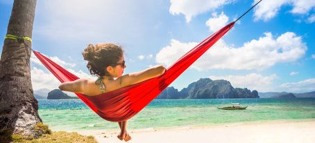 Enjoying the sun and sand on a hammock in Boracay Island, Philippines