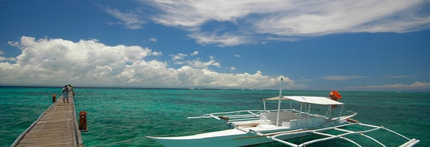 Start your island hopping experience at Hilutungan Island and enjoy its clear waters and great views