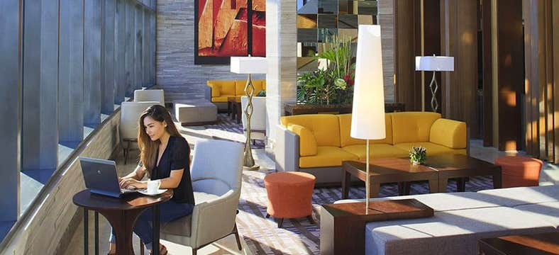 Hassle-Free 3-Day Holiday Inn Makati Package with Daily Breakfast & Manila Airport Transfer