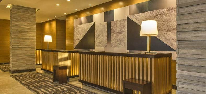 Hassle-Free 3-Day Holiday Inn Makati Package with Daily Breakfast & Manila Airport Transfer